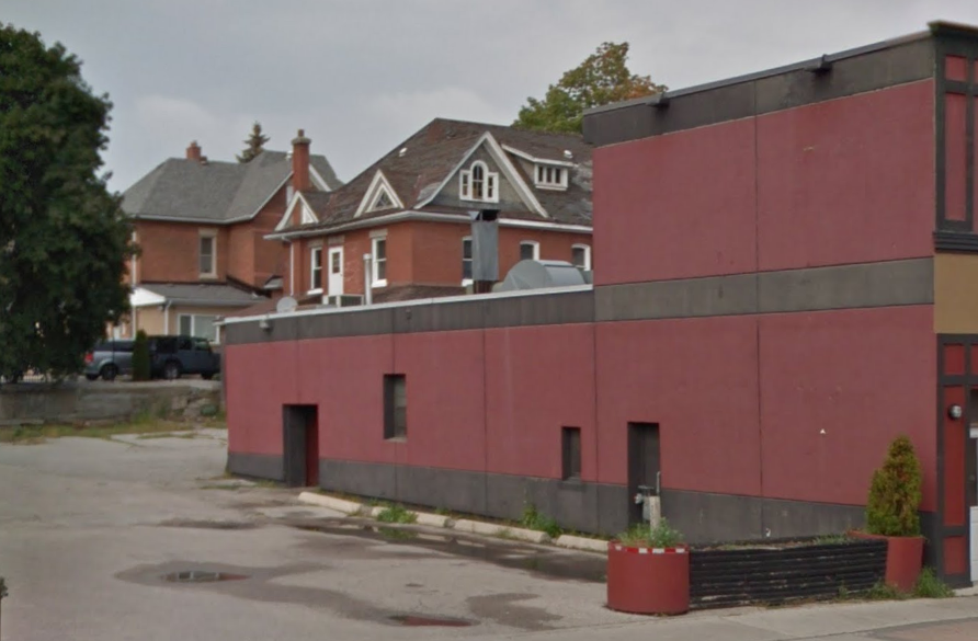 Town & Country restaurant, a blank wall being the first impression visitors got of Downtown Barrie